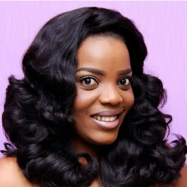 Fans Blast Actress Empress Njamah For Eating Eba With Long, Artificial Nails [See Photos]